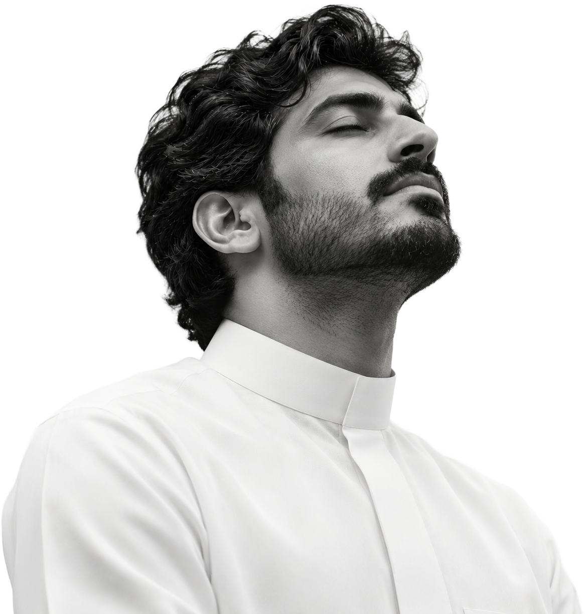 A young man in a white thobe with his eyes closed, calm, as JanB panels float around him.